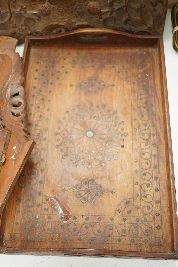 An Indian carved hardwood flat packed table and a similar inlaid tray, 46cm wide